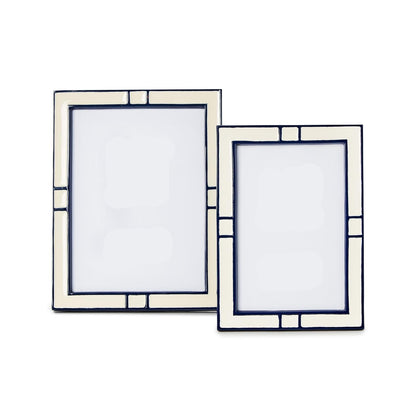 Two picture frames with decorative blue and white design on a white background