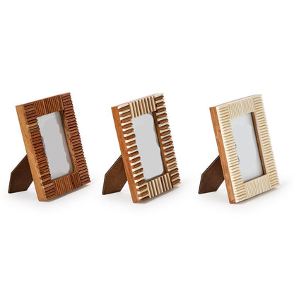 Three wooden picture frames with a 'T' on a white background