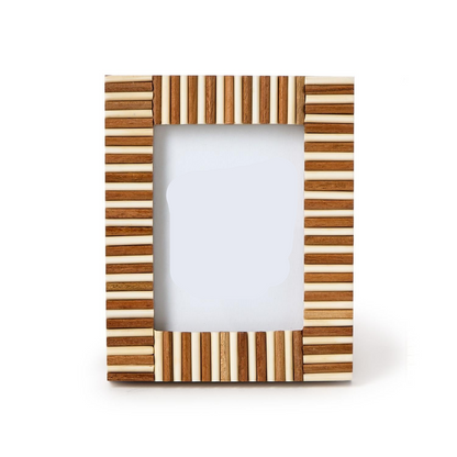 Wooden picture frame with striped design on a white background