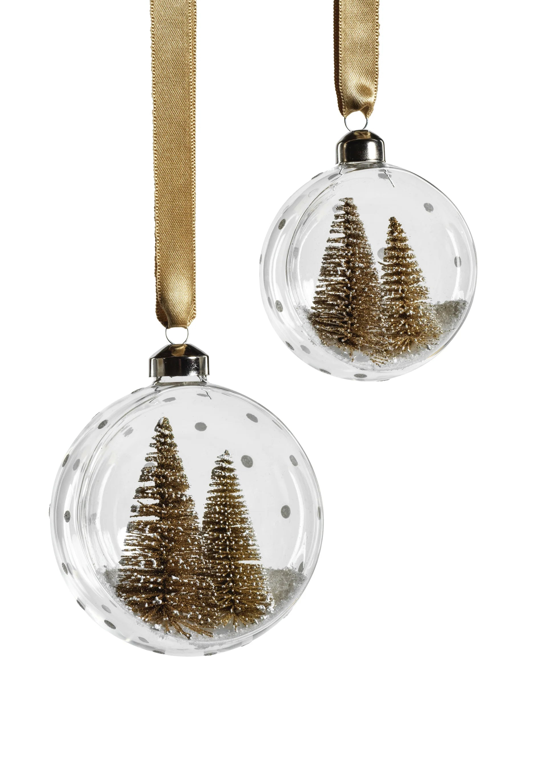 Clear Christmas ball ornaments with gold trees and ribbons on a white background